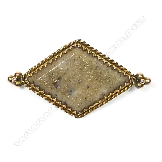 A. P. Buick 9ct gold and gold bearing quartz brooch,